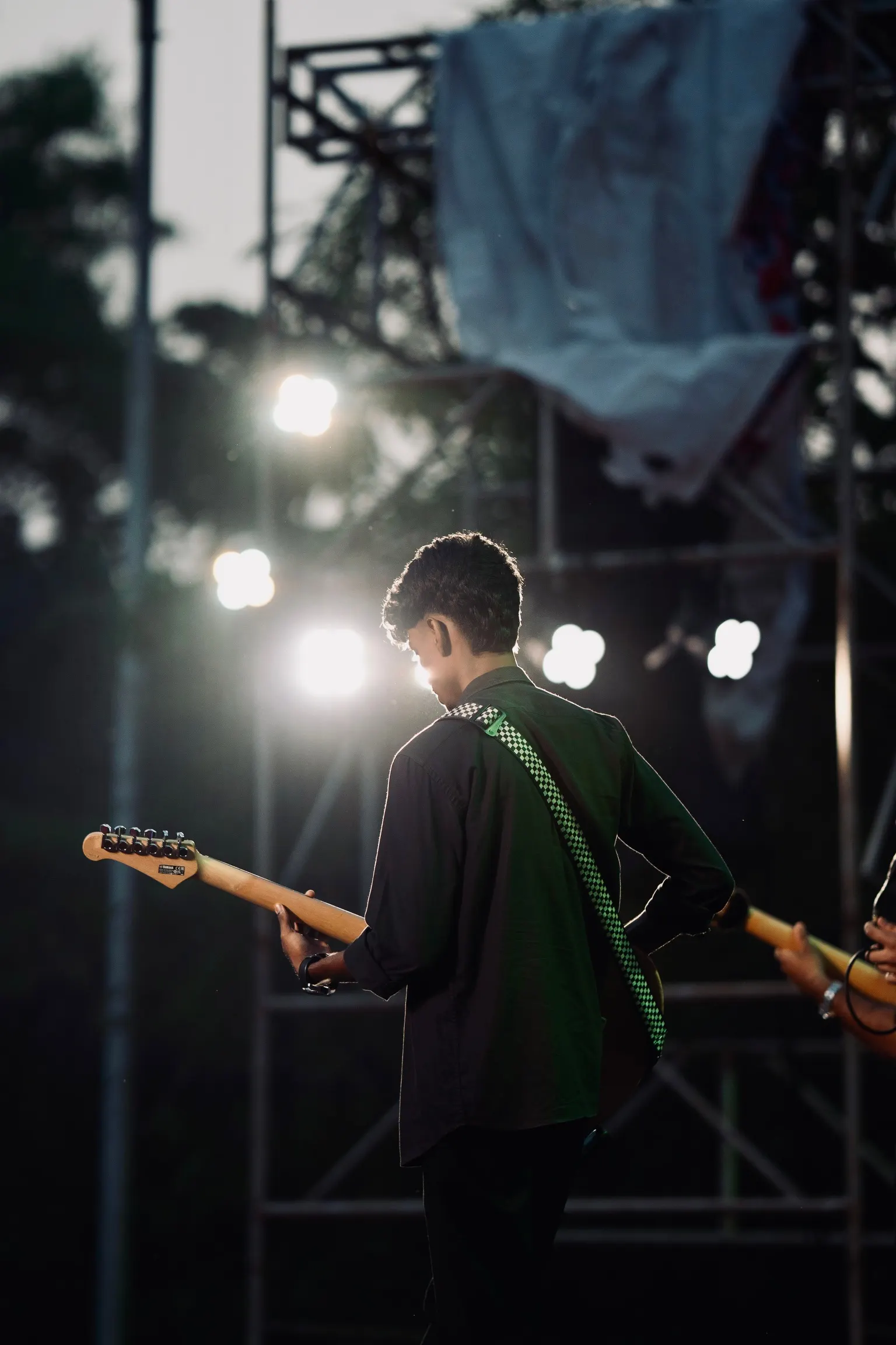 Backlit guitarist